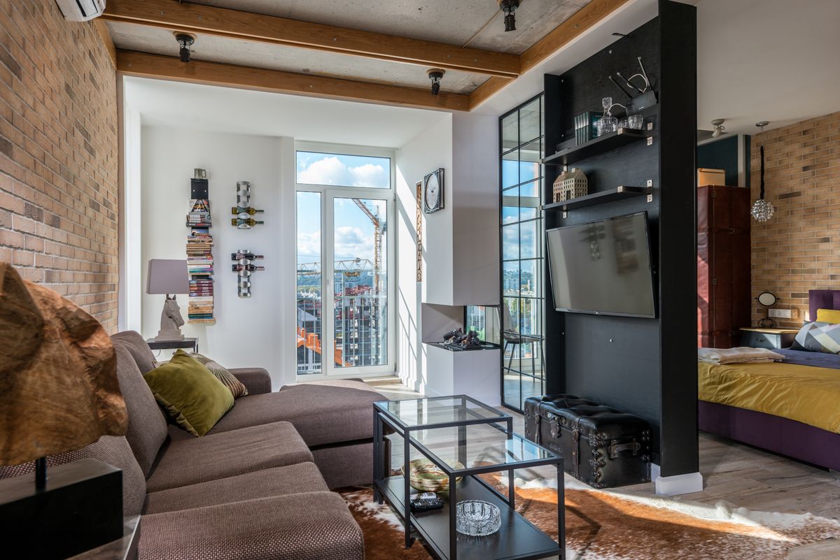 Illustrative open-plan apartment living space; not a photo of North Florence
